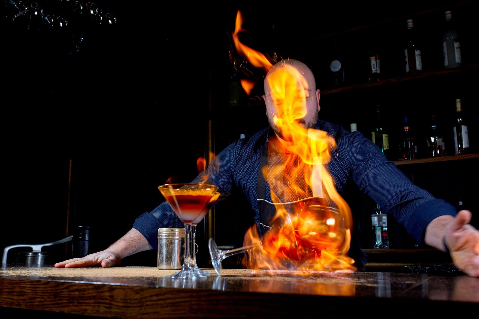 Fire and flair bottle show at the bar