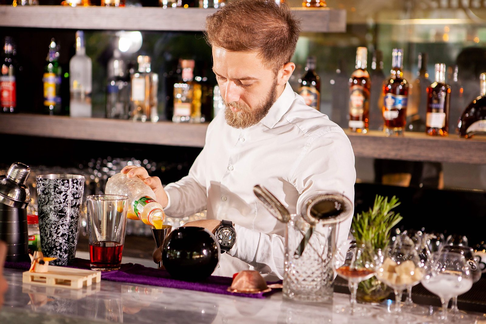 Flair bartender mixing cocktails